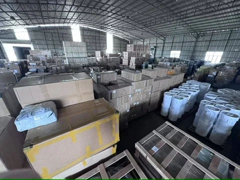 Full view of Jeoffel Cargo warehouse floor with stacked logistics freight