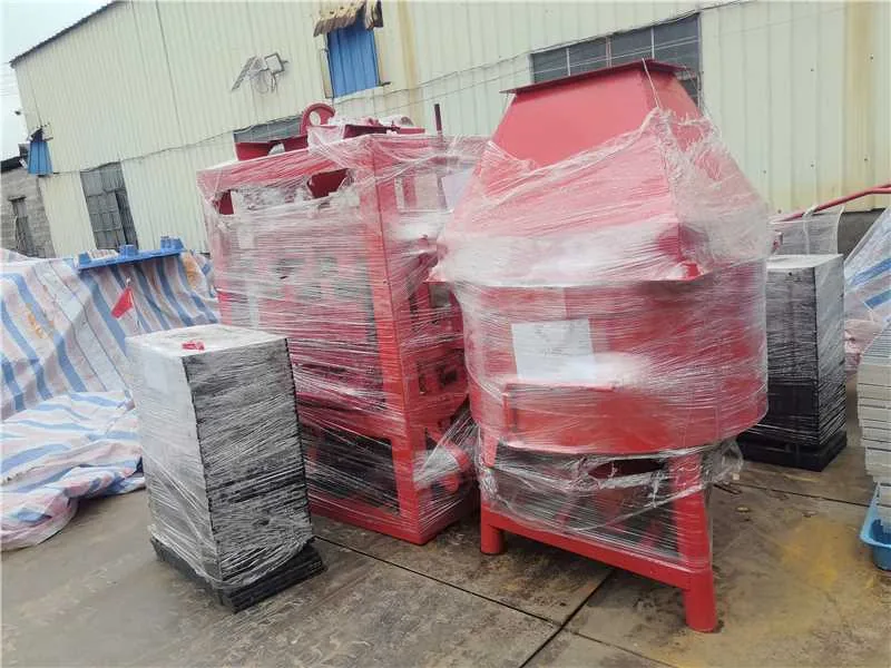 Heavy industrial machinery wrapped and staged at a Chinese factory yard, ready for export shipment