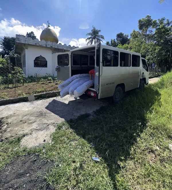 Jeoffel Cargo delivery van parked at a client location in Lanao Del Sur, Philippines